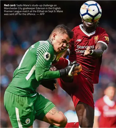  ??  ?? Sadio Mane’s studs-up challenge on Manchester City goalkeeper Ederson in the English Premier League match at the Etihad on Sept 9. Mane was sent off for the offence. — AFP Red card: