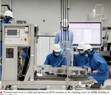 ASML lifts 2026 outlook on record AI chip orders, plans 1,700 job cuts ...