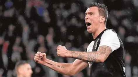  ?? AFP ?? Mario Mandzukic celebra un gol con la Juventus