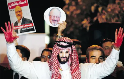  ?? LEFTERIS PITARAKIS / THE ASSOCIATED PRESS FILES ?? An activist wearing a mask depicting Saudi Crown Prince Mohammed bin Salman holds up his hands painted with fake blood at a candleligh­t vigil for Saudi journalist Jamal Khashoggi in Istanbul in October.