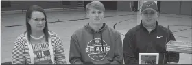  ?? NWA Democrat-Gazette/ANNETTE BEARD ?? Tate Busey, an athlete at Pea Ridge High School, signed a letter of intent to play baseball at the University of Central Arkansas on Wednesday. Joining Busey were his parents Tim and Autumn Busey.