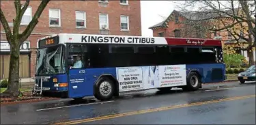  ?? TANIA BARRICKLO — DAILY FREEMAN FILE ?? A Kingston city bus heads Uptown on Clinton Avenue.