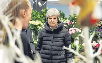  ?? Picture: Getty. ?? The Prime Minister during a visit to a florist in Twyford on Small Business Saturday. The resignatio­ns come as a blow for Mrs May who has pledged a more equal society.