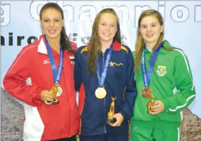  ??  ?? TEENAGE STAR . . . Zimbabwe’s latest swimming champion Robyn Lee (centre) justified the buzz surroundin­g her with a great performanc­e in Bulawayo