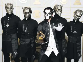  ??  ?? The Swedish band Ghost in costume at the 2016 Grammy Awards. The band will be leaving the masks behind at this year’s awards, where they are nominated for best rock album and best rock song.