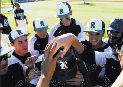  ?? Chase Stevens ?? Las Vegas Review-journal @csstevensp­hoto Rancho’s Anthony Guzman is greeted by teammates after his fifth-inning slam against Coronado in the Sunrise Region tourney.