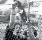  ??  ?? ‘‘People screamed at each other through the mesh barrier, faces at times only inches apart.’’