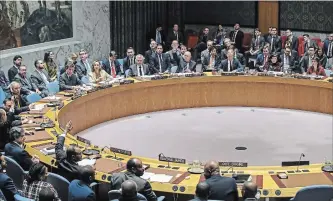  ?? DREW ANGERER GETTY IMAGES ?? Members of the UN Security Council vote on the third draft resolution to create a new inquiry to find blame for the chemical weapons attack last week in Douma, Syria.
