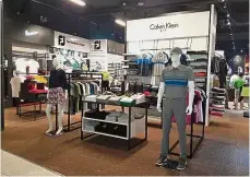  ??  ?? The store carries most of the leading brands in world golf.