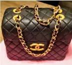  ??  ?? Bags of talent: Steven’s edible Chanel handbag with gold clutch