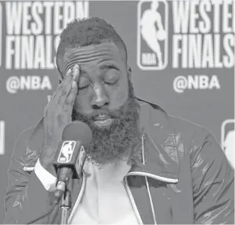  ?? Karen Warren / Houston Chronicle ?? Rockets guard James Harden has to relive the ups and mostly the downs of Game 7 in a postgame news conference after the nine-point loss to the Warriors.