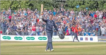  ??  ?? Calum MacLeod salutes the crowd after his superb innings.