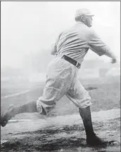 ?? AP ?? Cy Young set various records while he pitched in the major leagues. His 511th win took place in 1911.