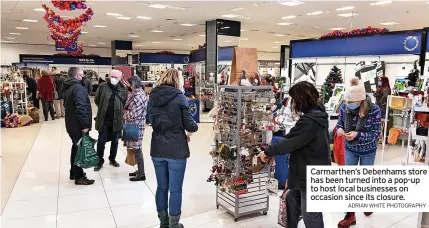  ?? ADRIAN WHITE PHOTOGRAPH­Y ?? Carmarthen’s Debenhams store has been turned into a pop-up to host local businesses on occasion since its closure.