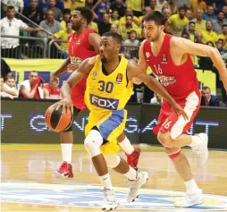  ?? (Adi Avishai) ?? MACCABI TEL AVIV guard Norris Cole had 22 points and seven rebounds against Olympiacos last night, but he missed a chance to win the game at the buzzer, with the Greeks triumphing 69-68 at Yad Eliyahu Arena.