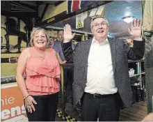  ?? BOB TYMCZYSZYN THE ST. CATHARINES STANDARD ?? Incumbent MPP Jim Bradley arrives at Pizza Jerry's to congratula­te NDP candidate Jennie Stevens after winning the election, Thursday.