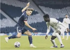  ??  ?? 0 Scotland’s James Forrest shapes to take on Taleb Tawatha in last month’s 1-1 Nations League draw against Israel at Hampden.