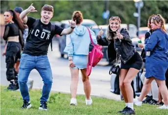  ??  ?? Party time? Revellers at the rave in Flixton, where three people were stabbed