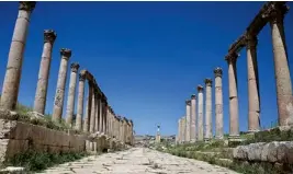  ??  ?? Tall pillars of the colonnaded street flank the walkway