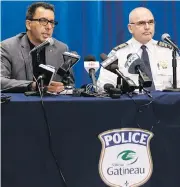  ?? ERROL MCGIHON / POSTMEDIA NEWS ?? Gatineau police Chief Mario Harel, left, and Insp. Serge Guindon speak Friday at news conference after the arrest of a Radio-Canada journalist.