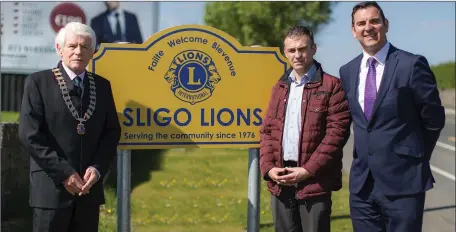  ??  ?? President of Sligo Lions Michael Leydon with Cllrs Dara Mulvey and Tom MacSharry at the unveiling of the Sligo Lions Club signs to mark the centenary of Lions Club Internatio­nal and 40 years of Sligo Lions Service to the community.