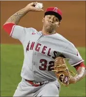  ?? Tony Gutierrez CLOSER RAISEL IGLESIAS Associated Press ?? is a valuable trade piece who could help another team’s bullpen.