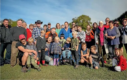  ?? PHOTO: LUZ ZUNIGA/ FAIRFAX NZ ?? Friends, sponsors and members of the community, who helped building a new special bathroom for young Miro Romanowsky, celebrated the achievemen­t with a lunch at Hira School.