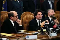  ?? AP/MASSIMO PERCOSSI ?? Italian prosecutor­s Federico Cafiero De Raho (from left), Giovanni Bombardier­i and Giuseppe Lombardo speak about drug syndicate arrests Wednesday at a news conference in Rome.