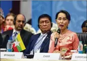  ?? AUNG SHINE OO / ASSOCIATED PRESS ?? Myanmar Foreign Minister Aung San Suu Kyi speaks Monday during a meeting of the Asia Europe Foreign Ministers at the internatio­nal convention center in Naypyitaw, Myanmar.