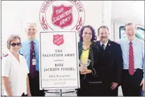  ??  ?? FedEx Global citizenshi­p manager Rose Jackson Flenorl (third from left) receives the prestigiou­s Salvation Army Partner In Mission Award from Salvation Army Maj. Rhea Dawn Woodcock (left), FedEx Express chief operating officer Mike Ducker, Salvation...