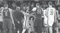  ?? JOE CAMPOREALE/USA TODAY SPORTS ?? Suns and Rockets players scuffle during the second half on Thursday at Footprint Center in Phoenix.