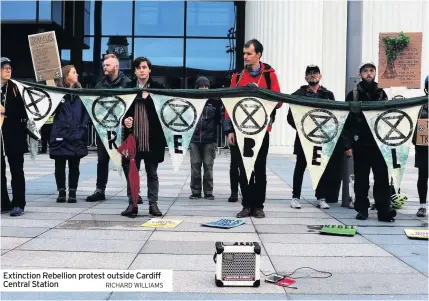  ?? RICHARD WILLIAMS ?? Extinction Rebellion protest outside Cardiff Central Station