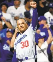  ?? Eric Christian Smith Associated Press ?? DODGERS manager Dave Roberts’ career winning percentage of .618 averages to 100 wins per season.