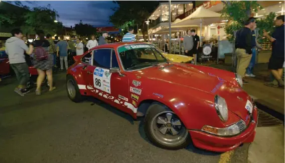  ??  ?? Above: A feature of the Adelaide Motorsport Festival is the Gouger Street party where the general public can get close to the cars and meet the drivers