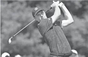  ??  ?? Jordan Spieth hits his tee shot on the third hole during the final round of the Dell Technologi­es Championsh­ip on Sunday. MARK KONEZNY/USA TODAY SPORTS