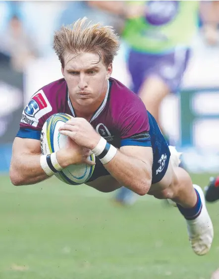  ?? Picture: ANESH DEBIKY/AFP ?? Tate McDermott scores for the Queensland Reds against the Sharks in Durban.