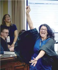  ?? — AFP ?? US Representa­tive-elect Rashida Tlaib (D-MI) reacts to a good number during an office lottery for new members of Congress on Capitol Hill.