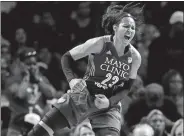  ?? ALEX GALLARDO/AP PHOTO ?? Minnesota’s Maya Moore reacts after making a shot and getting a foul called on the Sparks during the second half in Game 4 of the WNBA Finals on Sunday in Los Angeles. The Lynx won, 80-69, to force a decisive Game 5 tonight against the defending champion Sparks.