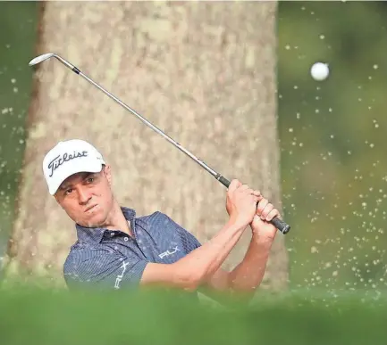  ?? BRAD PENNER/USA TODAY SPORTS ?? Justin Thomas hits out of a sand trap onto the 3rd green during the first round of the U.S. Open at Winged Foot Golf Club West on Thursday.