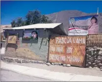  ?? CATHERINE SOLYOM/ POSTMEDIA NEWS ?? A sign posted entering Alto del Carmen reads ‘ Pascua Lama — bread today, hunger tomorrow.’