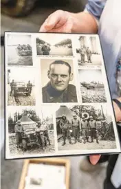  ?? PATRICK CONNOLLY/ORLANDO SENTINEL ?? Historical photos show Capt. John E. Mellen of the 818th Amphibious Truck Company during a visit to the Orlando Auto Museum at Dezerland Action Park on Nov. 8.