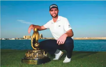  ?? Courtesy: Organiser ?? Adri Arnaus with the trophy after winning the Ras Al Khaimah Challenge Tour Grand Final at Al Hamra Golf Club yesterday.