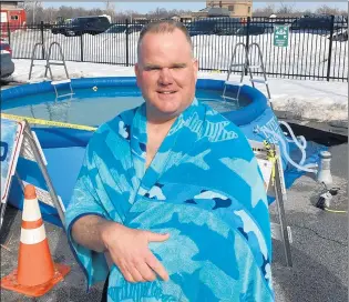  ??  ?? Tinley Park police Detective Sgt. Bill Devine stands next to the pool into which he and other officers were jumping.