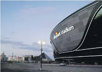  ??  ?? Allegiant Stadium, new home of the Las Vegas Raiders, with the Strip in the background.