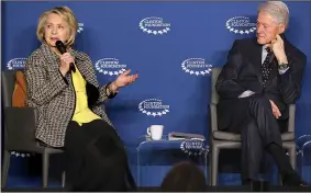  ?? Arkansas Democrat-Gazette/THOMAS METTHE ?? Former Secretary of State Hillary Rodham speaks Wednesday as she and her husband, former President Bill Clinton, participat­e in a panel discussion at the Economic Inclusion and Growth: The Way Forward conference in Little Rock.
