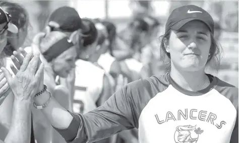  ?? [FAISAL ALI / THE OBSERVER] ?? After a stellar season, the EDSS girls slo pitch team fell in the final game June 13 to WO. Team members are Brittany Kron, Karyn Reynolds, Maddy Halstead, Jackie Wideman, Natalie Mayer, Rachel Wittie, Mackenzie Beisel, Jaimee MacDonald, Heidi Shantz,...