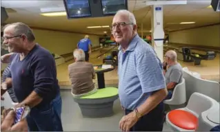  ?? GARY YOKOYAMA, THE HAMILTON SPECTATOR ?? Ron Ferguson with his bowling buddies on a Wednesday evening. Ferguson is 87 and has been bowling for 70 years twice a week.