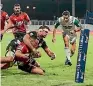  ??  ?? This tackle by Chiefs loose forward Lachlan Boshier on Crusaders second five-eighth Ryan Crotty resulted in a penalty try being awarded last Saturday night. Boshier was yellow carded.