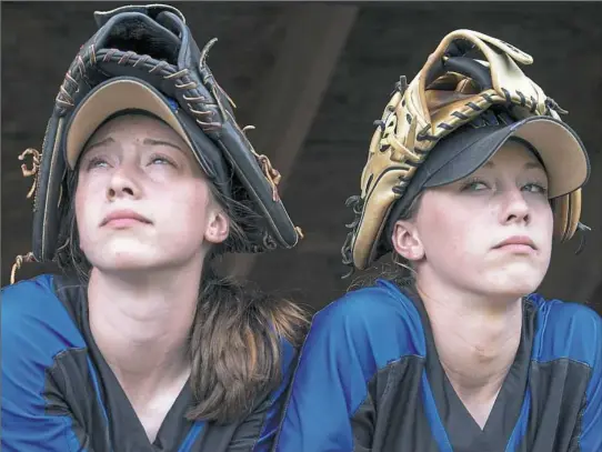  ?? Steph Chambers/Post-Gazette ?? West Greene twins Madison and McKenna Lampe led the softball team to a PIAA championsh­ip and have starred together in basketball. Now they will serve the Army in boot camp together.