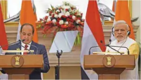  ?? - AFP ?? MAKING A POINT: Egyptian President Abdel Fattah El Sisi, left, and Indian Prime Minister Narendra Modi hold a joint press conference at Hyderabad House in New Delhi on Friday.